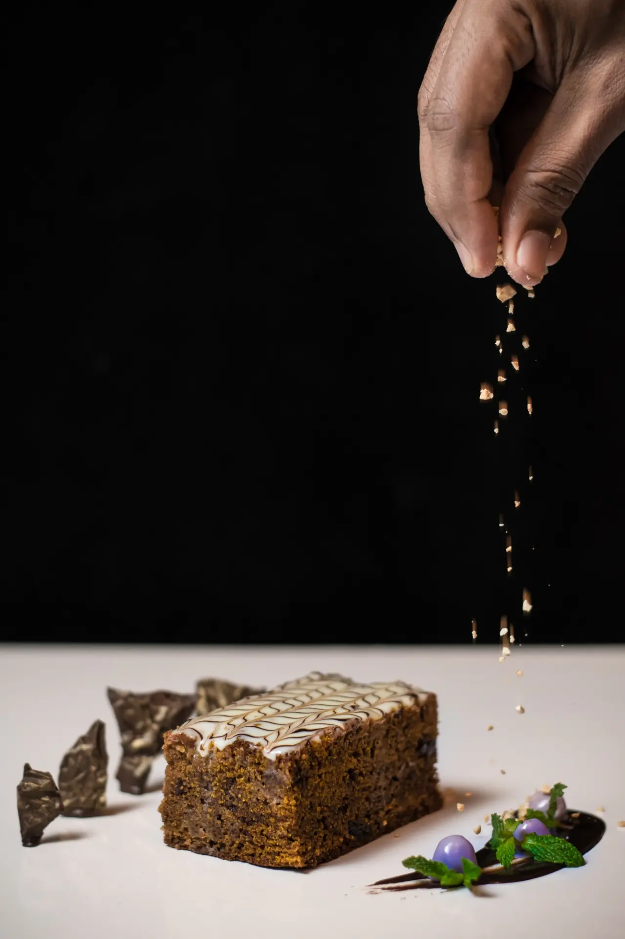 Chocolate dessert with crumb — action shot